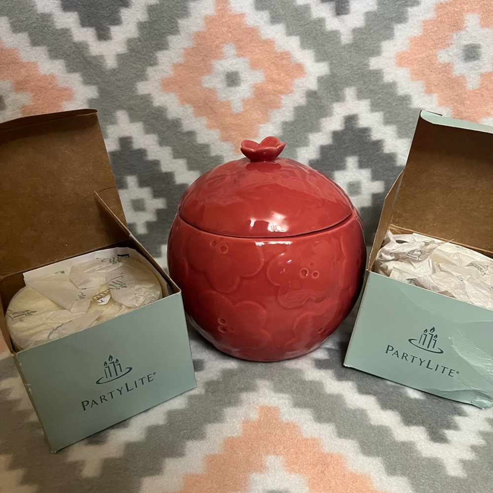 PartyLite cherry blossom candle holder with candles.